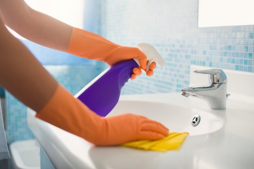 Customer completing a London House Cleaning payment securely